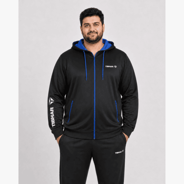 Man wearing a plus size black training jacket