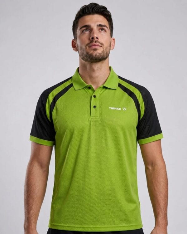 Man wearing a green Tibhar sports polo shirt