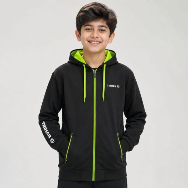 Boy wearing a black and green kids sports hoodie