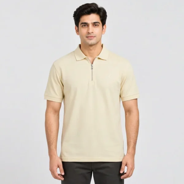 Man wearing a Sportlux Plus cream quarter zip polo